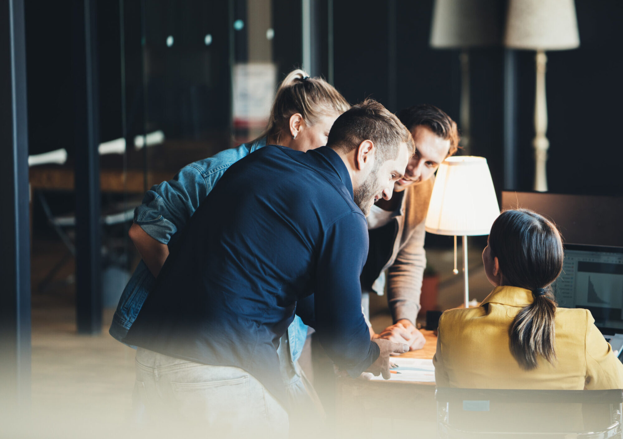 Group of young people in big office have a meeting and discussin